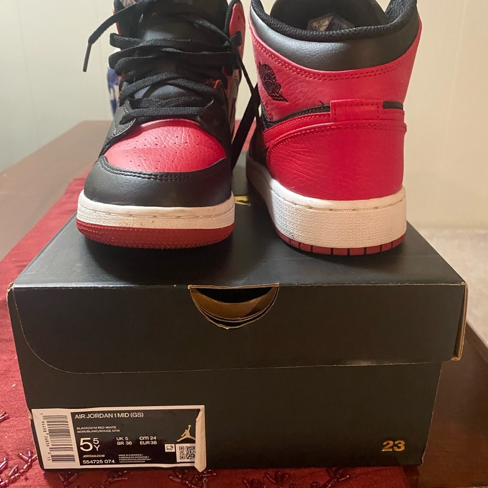 Air Jordan 1 Mid ‘Banned’ Black and Red Sneakers